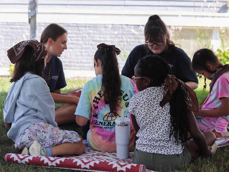 Kids and leaders gathered outdoors
