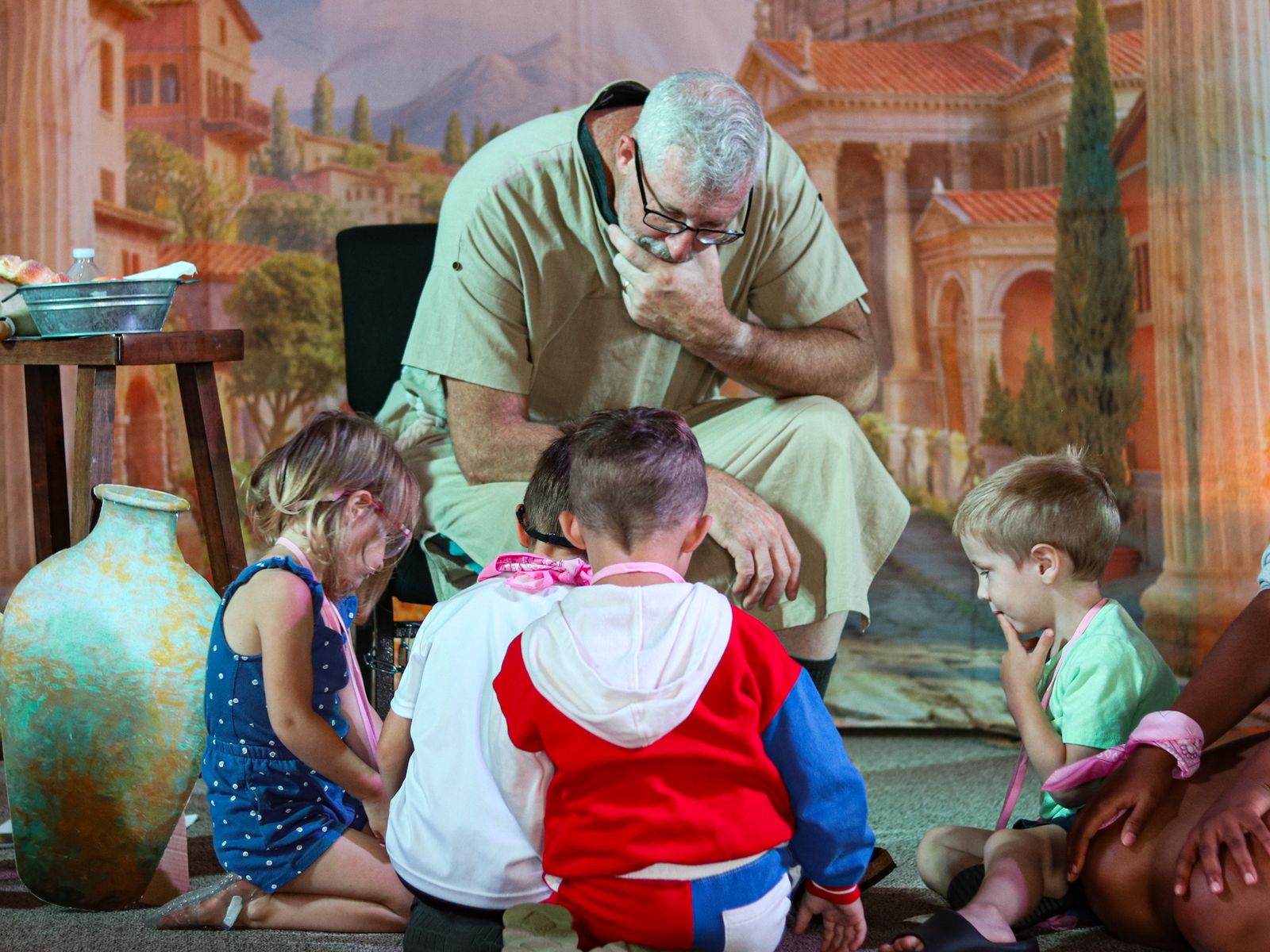 A LifeKids teacher sharing a Bible story with children